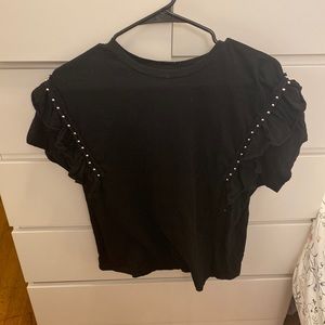 Black tshirt with ruffles on sleeves and silver details